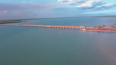 Drone Aerials of Rio Tinto Mining Bauxite Train Travelling Accross Weipa Bridge 動画素材 248353418