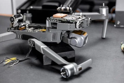 Drone after falling with broken legs and camera, disassembled drone Stock Photos