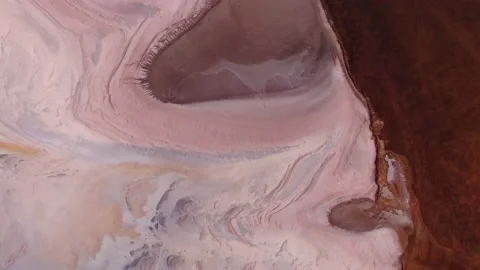 Drone alien abstract natural landscape pattern Pink salt lake algae bloom Russia Stock-Footage 155841755