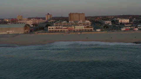 Drone along jersey shore asbury park sunrise1 Stock Footage 151541663