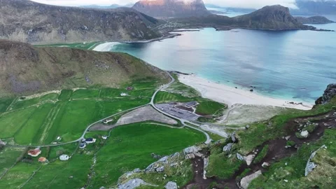 Drone along Mannen cliff above Haukland beach showing worn hiking path in 動画素材 314043134