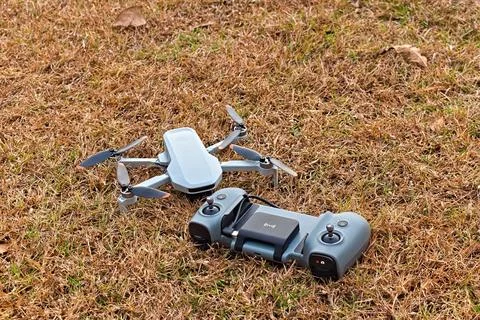 Drone and Controller on Ground Close Stock Photos