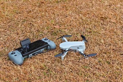 Drone and Controller on Ground Stock Photos