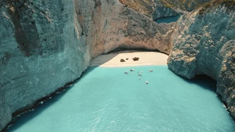 Drone angle approaching the shipwreck of Navagio in Zakynthos Stock Footage 291670920