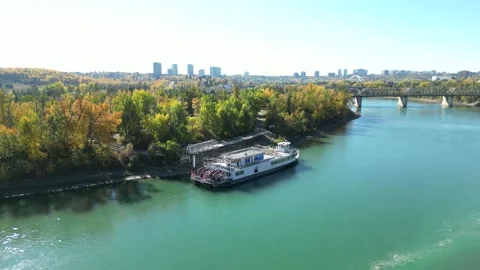 Drone angle of the Edmonton Queen Riverboat in fall Stock Footage 220448696