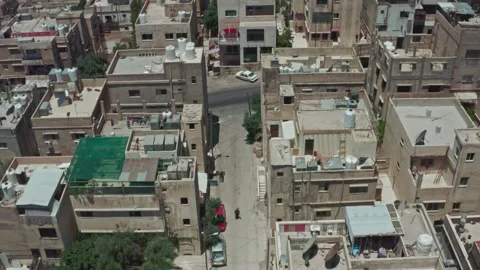 Drone Angled reverse shot for chaotic urban hood in Amman-Jordan 5/8/2023 Stock Footage 297236983