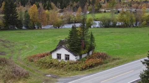 Drone approach to abandoned house with trees growing on its roof, Hemsedal Video stock 346547430
