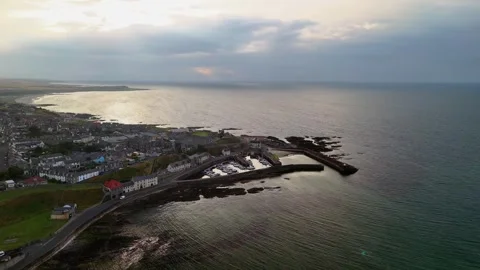 Drone Approach to Banff Harbour at Sunset, Scotland Golden Hour Stock Footage 333202704