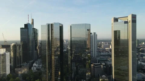 Drone approach between Deutsche Bank towers in financial district Stock Footage 331878663