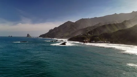 Drone approach to coastal rocks and cliffs, Roque de las Bodegas, Tenerife Stock Footage 336446826