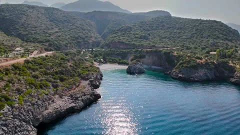 Drone Approach to Hidden Cove and Rocky Coast in Mani, Greece Stock-Footage 335375741