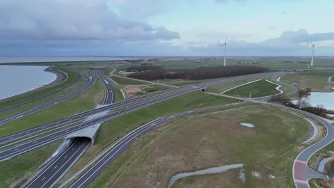 Drone approach to highway interchange before the dam Stock Footage 331828625
