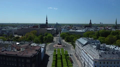 Drone Approach Over Rooftops to Church Spire Stock Footage 310053294
