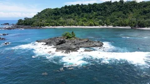 Drone Approach to San Josecito Beach Over Rocky Offshore Islet, Costa Rica Stock-Footage 342274270