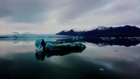 Drone Approach Toward Blue Iceberg in Jökulsárlón Glacier Lagoon, Iceland Stock Footage 292576280