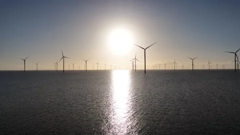 Drone approach toward offshore wind farm in golden backlight Stock-Footage 331824562