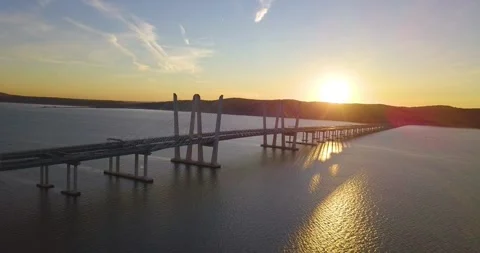 Drone approaches bridge at sunset 5 스톡 동영상 296430121