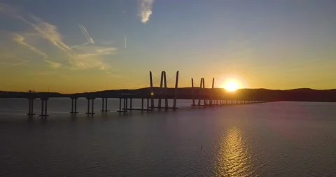 Drone approaches bridge at sunset 6 스톡 동영상 296429992