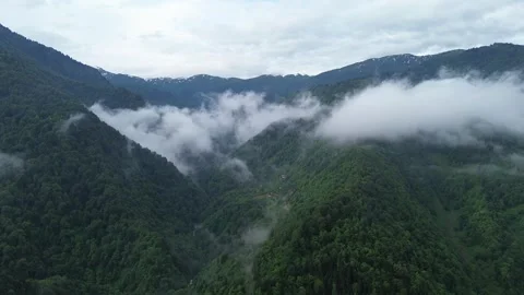 Drone Approaches Clouds Over Snow Capped Mountains, Adjara Georgia 스톡 동영상 337333513