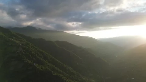 Drone approaches mountain ridge under dramatic sunset light, Adjara, Georgia Stock Footage 337335741