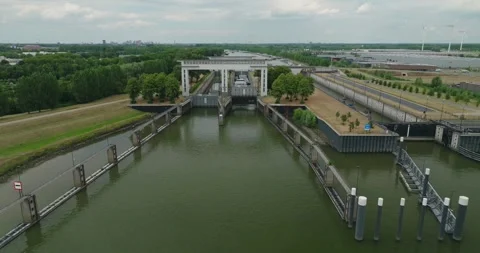 Drone Approaches Opening Sluice Gate With Tanker Barge Waiting in Lock Chamber Stock Footage 342348011