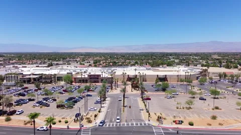 Drone Approaches The Shops at Palm Desert Shopping Mall 動画素材 339079220