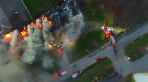 Drone approaching and flying above building fire Video stock 64364623
