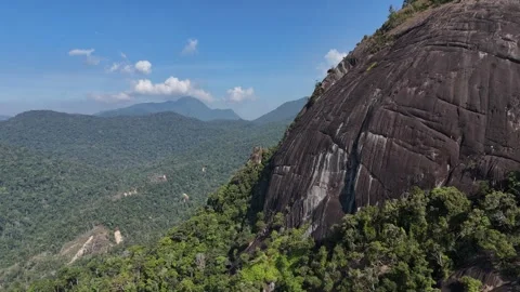 Drone approaching giant boulder and passing sharp rocky pinnacle 스톡 동영상 336956650