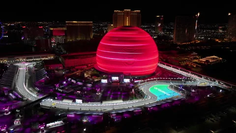 Drone approaching the illuminated sphere, during F1 Grand Prix in Las Vegas, USA Stock-Footage 300741610