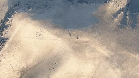 Drone approaching land, flying over a hill Video stock 128940194