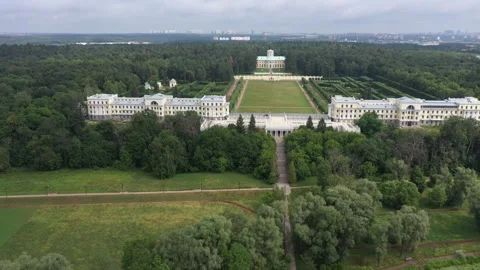 Drone approaching large classical palace and gardens Stock Footage 321896762