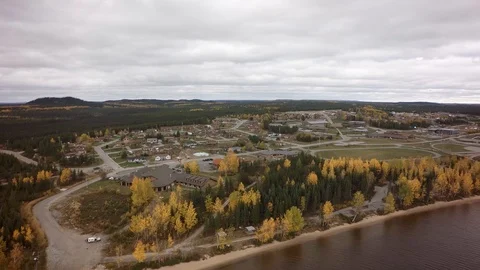 Drone approaching Ouje-Bougoumou cree town quebec north autumn Stock Footage 93204012