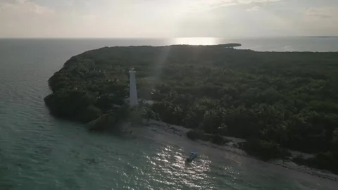 Drone approaching punta allen lighthouse in Tulum biosphere Sian Ka'an Mexico Video stock 253905975