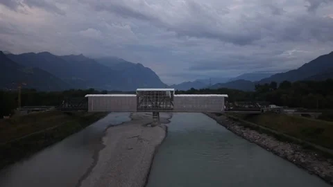 Drone approaching railway bridge covered with scaffolding over Rhine River Stock Footage 341801312