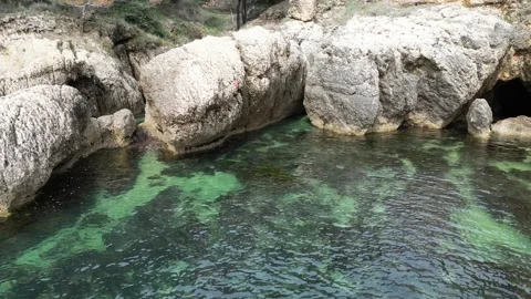 Drone approaching the rocky seashore Stock Footage 271028342