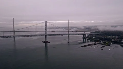 Drone approaching shot of Forth Bridges infrastructure road bridge near 스톡 동영상 116690675