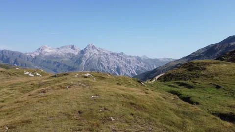 Drone approaching Splugen Pass and Teurihorn in the Italian Alps Stock Footage 319214607