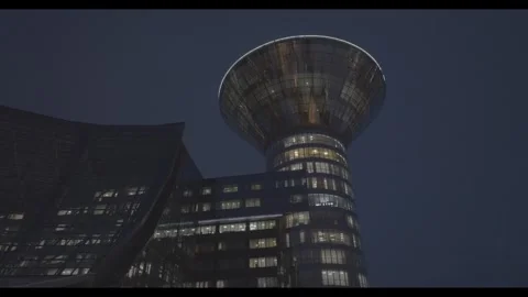 Drone approaching unique glass observation tower at night Video stock 320239067