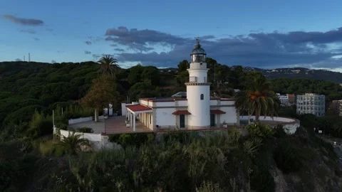 Drone Approaching White Lighthouse at Sunset, Costa Brava, Spain Vídeo Stock 319861032