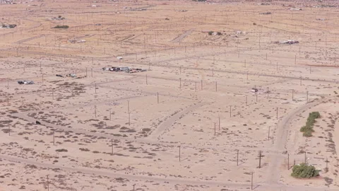 Drone Arc Over Power Lines and Empty Streets in Salton City California Видео 332683179