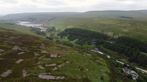 Drone ariel point of view. Derbyshire Peak District moorlands with winding .. Video stock 240180412