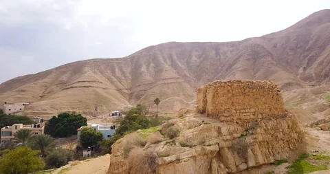 Drone around ancient gate to enter the road between Jericho and Jerusalem. Video stock 125114915