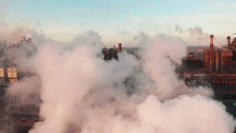 Drone around toxic enterprise chimneys tubing against the sky background release Stock-Footage 167324125