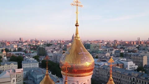 Drone ascending above monastery domes at sunrise Stock Footage 322933643
