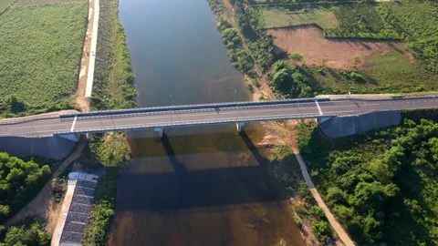 Drone Ascending Above River Valley and Mountains Stock Footage 336857090