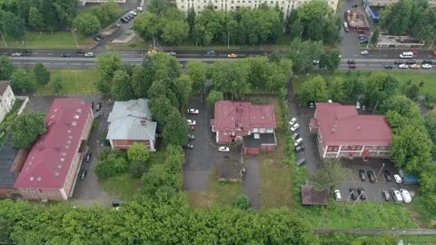 Drone ascending and pulling back over residential area Stock Footage 328101048