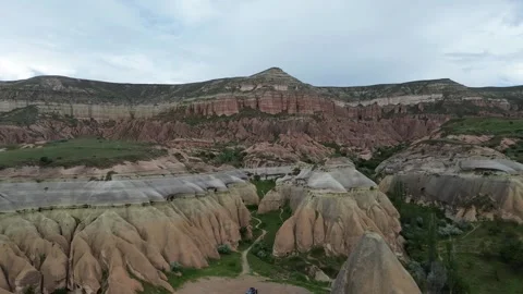 Drone Ascending from Base to Peak of Rose Valley Revealing Mountain Panorama Stock Footage 336482926