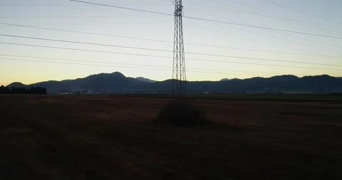 Drone ascending close to power line wires Stock Footage 147927438