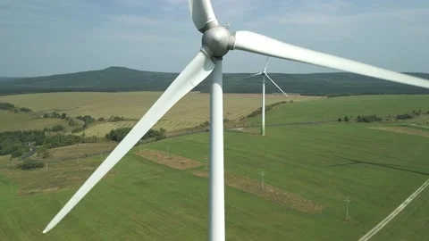 Drone Ascending Closely Towards Wind Turbine Stock Footage 314940416