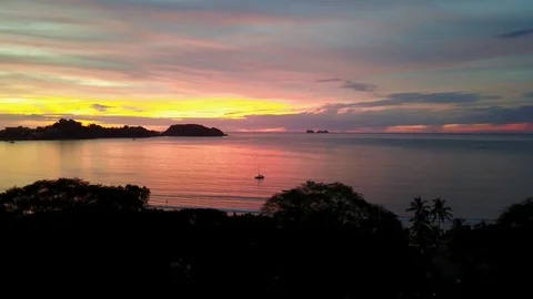 Drone ascending during sunset Playa Potrero Stock Footage 91107464